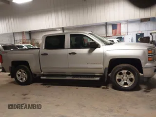 2014 Chevrolet Silverado 1500 LT with VIN 3GCUKREC4EG291351, listed as a IAAI auction lot 41732290 with 194,135 mi miles and . Bid and sale history available at DreamBid. Image 13.