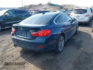 2016 BMW 4 Series 428i xDrive with VIN WBA4C9C56GG141089, listed as a IAAI auction lot 41587479 with 85,462 mi miles and . Bid and sale history available at DreamBid. Image 4.