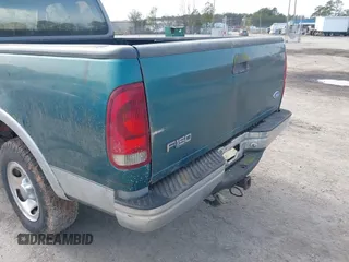 1997 Ford F-150 XL with VIN 1FTDX18W3VNC52363, listed as a IAAI auction lot 41610485 with 98,379 mi miles. Bid and sale history available at carsss.com. Image 6.