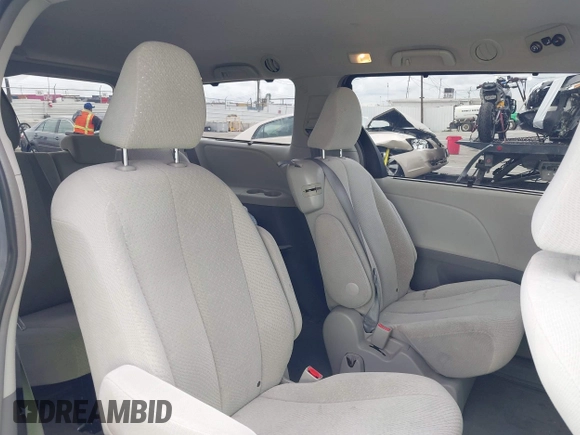 2012 Toyota Sienna LE AAS with VIN 5TDKK3DC8CS232582, listed as a IAAI auction lot 42068684 with 89,556 mi miles and . Bid and sale history available at DreamBid. Image 8.
