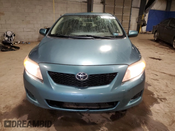 2010 Toyota Corolla with VIN JTDBU4EE7A9121808, listed as a Copart auction lot 57801605 with 114,778 mi miles and Salvage title. Bid and sale history available at DreamBid. Image 5.