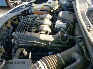 2014 Chrysler 200 Touring z VIN 1C3BCBEG7EN127389, wystawiony jako IAAI lot #41430522 z przebiegiem 121 491 mil mil oraz . Historia ofert i sprzedaży dostępna na DreamBid. Obrazek 12.