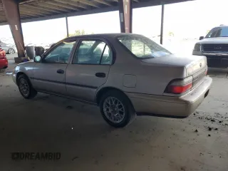 1997 Toyota Corolla with VIN 1NXBA02E4VZ577026, listed as a Copart auction lot 66184515 with 201,324 mi miles and Clean title. Bid and sale history available at DreamBid. Image 2.