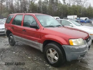2001 Ford Escape XLS with VIN 1FMYU02181KA64401, listed as a Copart auction lot 44216825 with 196,408 mi miles and Salvage Title. Bid and sale history available at carsss.com. Image 4.