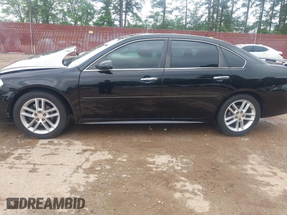 2014 Chevrolet Impala LTZ with VIN 2G1WC5E36E1138809, listed as a IAAI auction lot 41961255 with 119,222 mi miles and . Bid and sale history available at DreamBid. Image 15.