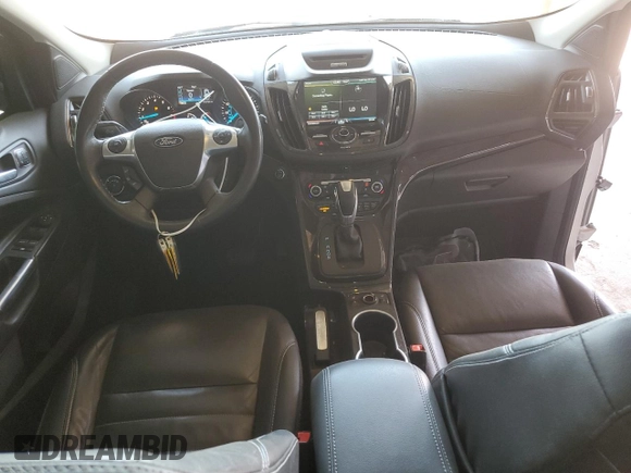 2015 Ford Escape Titanium with VIN 1FMCU9J96FUB33670, listed as a Copart auction lot 61826915 with 179,794 mi miles and Salvage title. Bid and sale history available at DreamBid. Image 8.