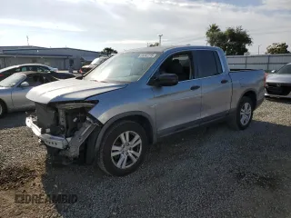 2017 Honda Ridgeline RT with VIN 5FPYK2F23HB010110, listed as a Copart auction lot 58382215 with 128,621 mi miles and Salvage title. Bid and sale history available at DreamBid. Image 1.