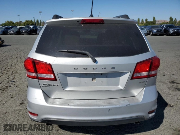 2012 Dodge Journey SXT z VIN 3C4PDDBG0CT293331, wystawiony jako Copart lot #62602995 z przebiegiem 185 605 mil mil oraz Szkoda całkowita • Salvage title. Historia ofert i sprzedaży dostępna na DreamBid. Obrazek 6.