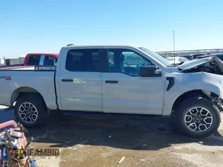 2023 Ford F-150 XL with VIN 1FTFW1E57PKE62881, listed as a IAAI auction lot 41481403 with 20,603 mi miles. Bid and sale history available at carsss.com. Image 13.