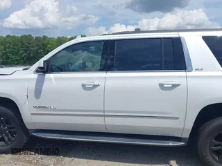 2017 GMC Yukon XL SLT z VIN 1GKS2GKC5HR160468, wystawiony jako IAAI lot #42166908 z przebiegiem 131 469 mil mil oraz . Historia ofert i sprzedaży dostępna na DreamBid. Obrazek 14.