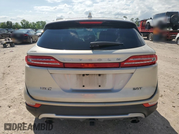 2017 Lincoln MKC Select z VIN 5LMCJ2C96HUL19657, wystawiony jako Copart lot #54157965 z przebiegiem 142 646 mil mil oraz Szkoda całkowita • Salvage title. Historia ofert i sprzedaży dostępna na DreamBid. Obrazek 6.