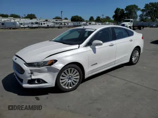 2013 Ford Fusion SE Hybrid z VIN 3FA6P0LU6DR325719, wystawiony jako Copart lot #55777715 z przebiegiem 152 478 mil mil oraz Szkoda całkowita • Salvage title. Historia ofert i sprzedaży dostępna na DreamBid. Obrazek 1.
