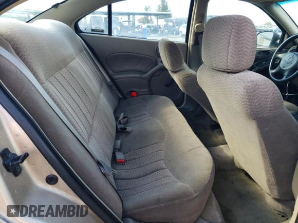 2001 Pontiac Grand Am SE z VIN 1G2NE52T91M583582, wystawiony jako Copart lot #77808974 z przebiegiem 126 219 mil mil oraz Szkoda całkowita • Salvage title. Historia ofert i sprzedaży dostępna na DreamBid. Obrazek 11.