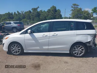 2013 Mazda 5 Touring with VIN JM1CW2CL8D0153437, listed as a IAAI auction lot 42181891 with 118,610 mi miles and . Bid and sale history available at DreamBid. Image 15.