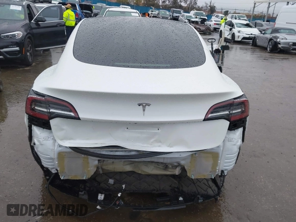 2023 Tesla Model 3 with VIN 5YJ3E1EA8PF578199, listed as a IAAI auction lot 41735465 with 50,823 mi miles and . Bid and sale history available at DreamBid. Image 16.