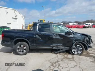2019 Honda Ridgeline RTL z VIN 5FPYK3F50KB000027, wystawiony jako IAAI lot #41856522 z przebiegiem 98 590 mil mil oraz . Historia ofert i sprzedaży dostępna na DreamBid. Obrazek 14.