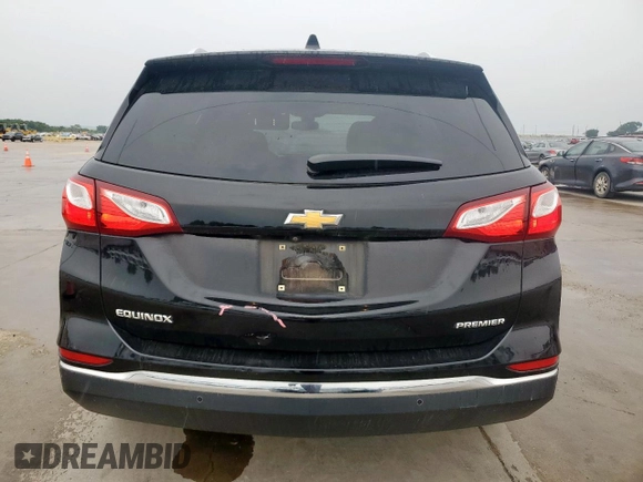 2021 Chevrolet Equinox Premier z VIN 2GNAXNEV9M6136701, wystawiony jako Copart lot #57288215 z przebiegiem 62 808 mil mil oraz Szkoda całkowita • Salvage title. Historia ofert i sprzedaży dostępna na DreamBid. Obrazek 6.