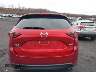 2018 Mazda CX-5 Grand Touring with VIN JM3KFBDM0J0427753, listed as a IAAI auction lot 41740838 with 69,683 mi miles and . Bid and sale history available at DreamBid. Image 16.