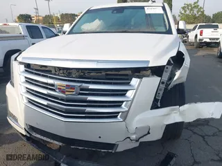 2016 Cadillac Escalade Platinum with VIN 1GYS4DKJ5GR260260, listed as a IAAI auction lot 41476668 with 108,058 mi miles. Bid and sale history available at carsss.com. Image 6.
