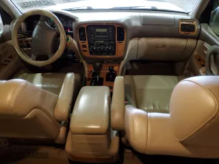1999 Toyota Land Cruiser with VIN JT3HT05J2X0049288, listed as a Copart auction lot 42304455 with 255,285 mi miles and Salvage Title. Bid and sale history available at carsss.com. Image 8.