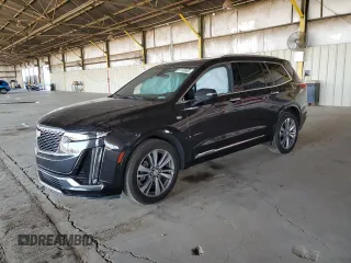 2020 Cadillac XT6 FWD Premium Luxury with VIN 1GYKPCRS8LZ149860, listed as a Copart auction lot 61108985 with 58,459 mi miles and Salvage title. Bid and sale history available at DreamBid. Image 1.