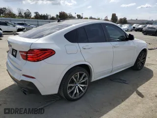 2018 BMW X4 M40i with VIN 5UXXW7C57J0W63952, listed as a Copart auction lot 47435363 with 67,198 mi miles. Bid and sale history available at carsss.com. Image 3.