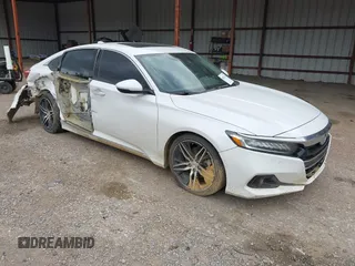 2021 Honda Accord Touring z VIN 1HGCV2F92MA020218, wystawiony jako IAAI lot #41827116 z przebiegiem 122 696 mil mil oraz . Historia ofert i sprzedaży dostępna na DreamBid. Obrazek 1.