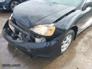 2003 Honda Civic EX with VIN 1HGEM22973L024883, listed as a IAAI auction lot 41536461 with 219,927 mi miles. Bid and sale history available at carsss.com. Image 6.