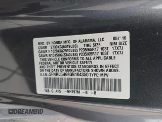 2016 Honda Odyssey EX-L with VIN 5FNRL5H68GB104350, listed as a IAAI auction lot 42023306 with 124,672 mi miles. Bid and sale history available at carsss.com. Image 9.