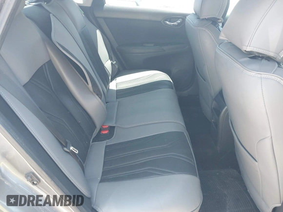 2018 Nissan Sentra S with VIN 3N1AB7AP1JY219661, listed as a IAAI auction lot 42001932 with 114,836 mi miles and . Bid and sale history available at DreamBid. Image 8.