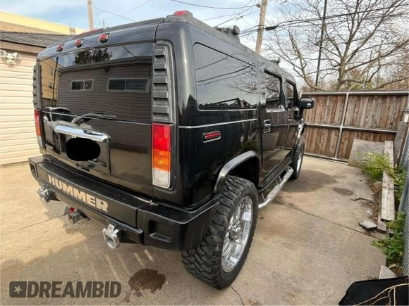 2004 Hummer H2 with VIN 5GRGN23U14H115951, listed as a Copart auction lot 83967054 with 88,845 mi miles and Clean Title. Bid and sale history available at carsss.com. Image 4.