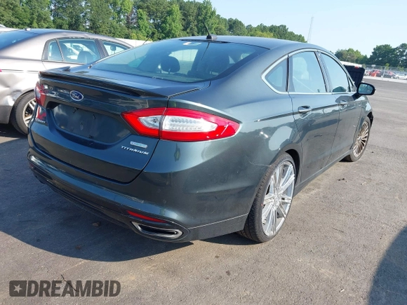 2016 Ford Fusion Titanium with VIN 3FA6P0K90GR188049, listed as a IAAI auction lot 42575477 with 239,414 mi miles and . Bid and sale history available at DreamBid. Image 4.