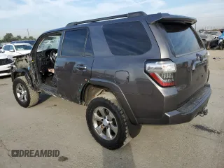 2018 Toyota 4Runner SR5 with VIN JTEBU5JR7J5606564, listed as a Copart auction lot 82647504 with 149,936 mi miles and Salvage Title. Bid and sale history available at carsss.com. Image 2.
