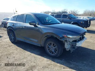 2019 Mazda CX-5 Touring with VIN JM3KFBCM7K0611896, listed as a IAAI auction lot 41732111 with 90,826 mi miles. Bid and sale history available at carsss.com. Image 1.