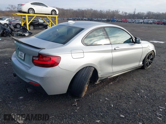 2016 BMW 2 Series M235i with VIN WBA1J7C54GV359301, listed as a IAAI auction lot 41186271 with 97,671 mi miles. Bid and sale history available at carsss.com. Image 4.