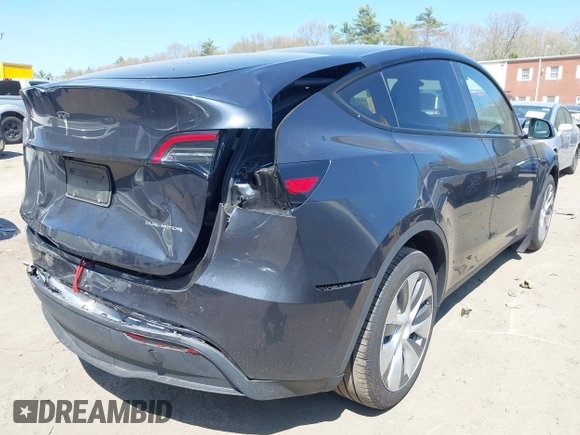 2024 Tesla Model Y Long Range with VIN 7SAYGDEE6RA225161, listed as a IAAI auction lot 42083140 with 28,289 mi miles and . Bid and sale history available at DreamBid. Image 4.