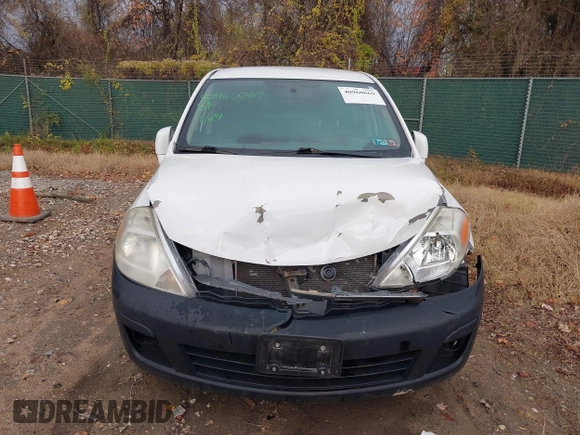 2009 Nissan Versa 1.8 S with VIN 3N1BC11E49L416720, listed as a IAAI auction lot 40960069 with 130,131 mi miles. Bid and sale history available at carsss.com. Image 12.
