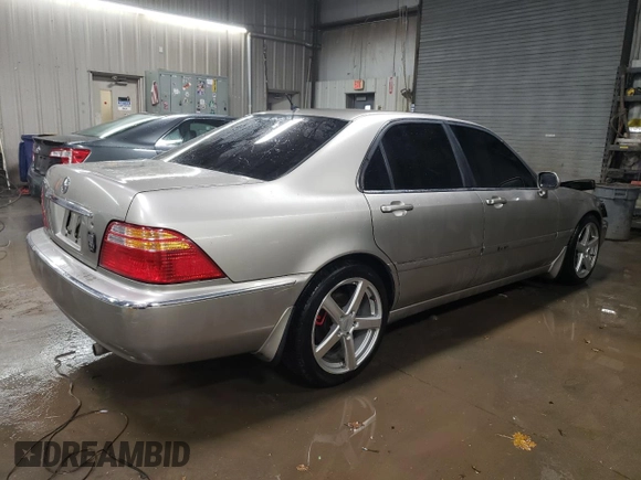 2002 Acura RL z VIN JH4KA96502C012064, wystawiony jako Copart lot #88080895 z przebiegiem 107 477 mil mil oraz Szkoda całkowita • Salvage title. Historia ofert i sprzedaży dostępna na DreamBid. Obrazek 3.