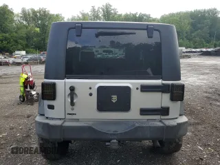 2007 Jeep Wrangler X with VIN 1J4FA24117L202404, listed as a Copart auction lot 58690485 with 126,347 mi miles and Salvage title. Bid and sale history available at DreamBid. Image 6.