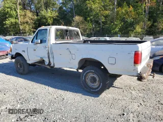 1990 Ford F-250 with VIN 1FTHF26H2LNA64235, listed as a Copart auction lot 74459134 with 249,821 mi miles and Salvage Title. Bid and sale history available at carsss.com. Image 2.