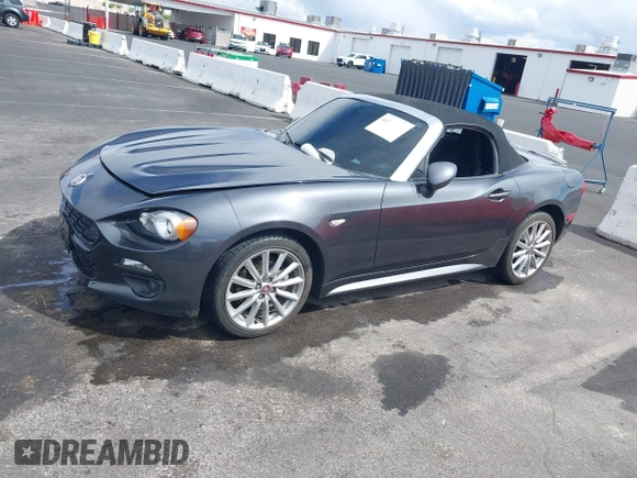 2018 FIAT 124 Spider Classica z VIN JC1NFAEK3J0137856, wystawiony jako IAAI lot #41959793 z przebiegiem 49 513 mil mil oraz . Historia ofert i sprzedaży dostępna na DreamBid. Obrazek 14.