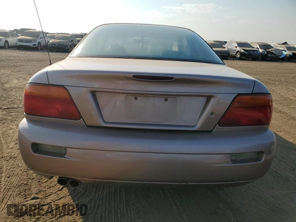 1996 Chrysler Sebring LXi z VIN 4C3AU52N4TE314534, wystawiony jako Copart lot #75043814 z przebiegiem 77 408 mil mil oraz Czysty tytuł • Clean title. Historia ofert i sprzedaży dostępna na DreamBid. Obrazek 6.