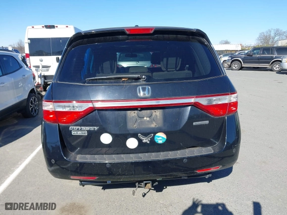 2013 Honda Odyssey Touring with VIN 5FNRL5H99DB076385, listed as a IAAI auction lot 41751504 with 233,875 mi miles. Bid and sale history available at carsss.com. Image 16.