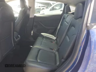 2022 Tesla Model Y Performance z VIN 7SAYGDEF6NF337710, wystawiony jako Copart lot #60200985 z przebiegiem 101 168 mil mil oraz Szkoda całkowita • Salvage title. Historia ofert i sprzedaży dostępna na DreamBid. Obrazek 10.