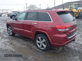 2014 Jeep Grand Cherokee Overland with VIN 1C4RJFCG9EC299235, listed as a IAAI auction lot 41670065 with 108,589 mi miles and . Bid and sale history available at DreamBid. Image 3.