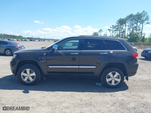 2011 Jeep Grand Cherokee Overland with VIN 1J4RR6GT1BC647292, listed as a IAAI auction lot 42069742 with 199,340 mi miles. Bid and sale history available at carsss.com. Image 14.