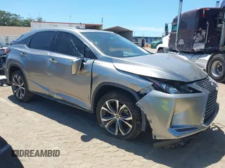 2021 Lexus RX 350 z VIN 2T2HZMAA2MC211568, wystawiony jako IAAI lot #42701950 z przebiegiem 49 439 mil mil oraz . Historia ofert i sprzedaży dostępna na DreamBid. Obrazek 1.