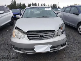 2004 Toyota Corolla CE with VIN 1NXBR32E74Z336134, listed as a IAAI auction lot 41966813 with 257,177 mi miles. Bid and sale history available at carsss.com. Image 12.