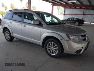 2014 Dodge Journey SXT with VIN 3C4PDCBG8ET115387, listed as a IAAI auction lot 42042535 with 171,279 mi miles. Bid and sale history available at carsss.com. Image 1.