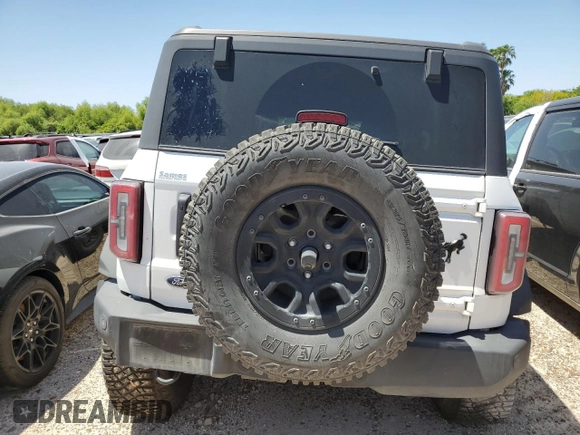 2024 Ford Bronco Wildtrak with VIN 1FMEE2BP9RLA07694, listed as a Copart auction lot 51856335 with 21,102 mi miles and Salvage title. Bid and sale history available at DreamBid. Image 6.